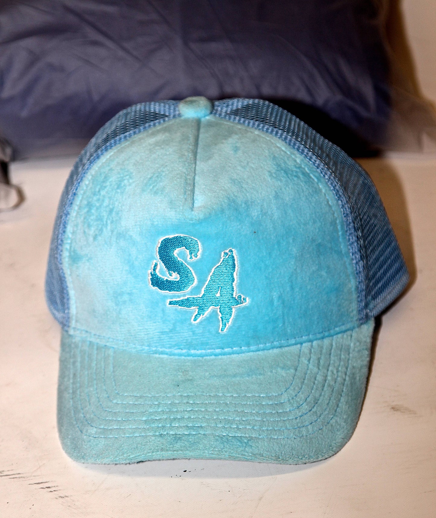 Blue Raspberry velvet trucker hat